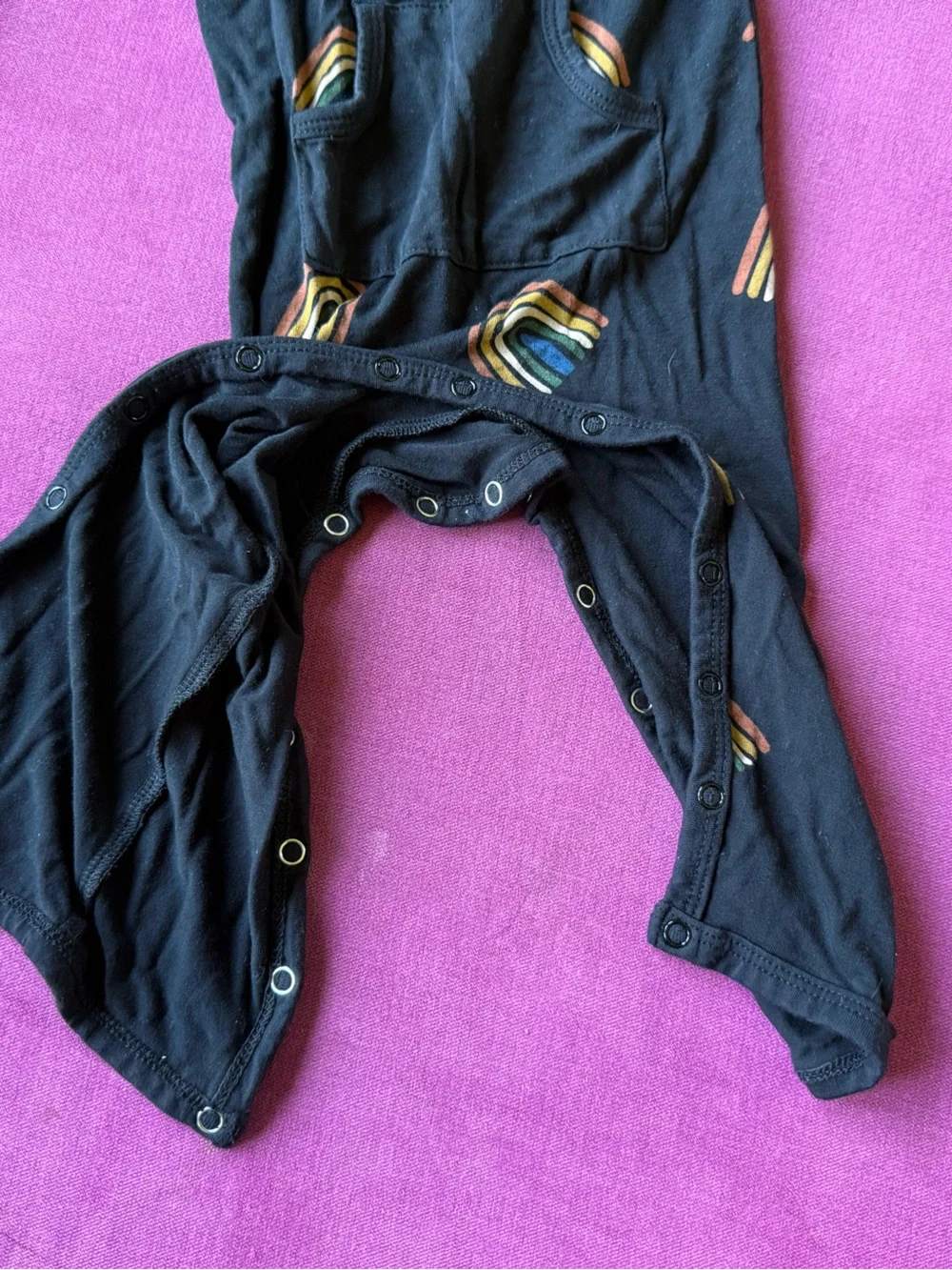 Kyte BABY Black One-Piece with Rainbow Motifs